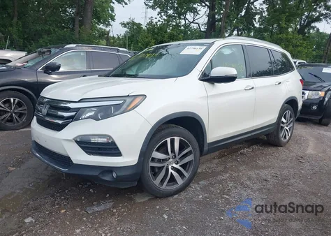 2018 Honda Pilot Touring из США, поврежденный, VIN 5FNYF6H99JB056304